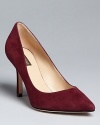 Sleek suede defines these stylish, pointed toe pumps by Joan & David.