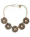 Spruce up your look for spring. Fossil's vintage-themed collar necklace features five intricate daisy's with sparkling crystal-coated centers. Setting crafted in oxidized brass tone mixed metal with a lobster claw closure. Approximate length: 18 inches.