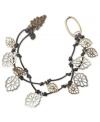 Knot your typical bracelet. Lucky Brand's leather bracelet features reconstituted semi-precious citrine and silver and gold tone openwork charms on a knotted leather cord. Approximate length: 7-1/2 inches.