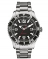 A classic stainless steel watch with luminous hands, by Nautica.