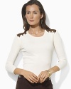 Cut in a relaxed, feminine silhouette, a supremely soft ribbed cotton top is finished with faux-suede patches and stitching at the shoulders for a chic, rustic vibe.
