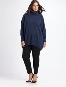 Almost too-chic-to-be-true, an easy-fitting, oval silhouette in plush merino wool. TurtleneckRibbed neck, cuffs and bottomSlash pockets About 29 from shoulder to hem Merino woolHand washImported