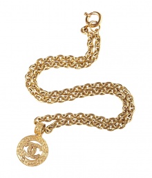 Luxurious gold necklace with stylish logo charm - by Chanel Vintage Jewelry - all vintage pieces are original Chanel creations of the 1970s, 80s and 90s - decorative coil chain with elegant curved Chanel logo pendant - utmost nobel and decorative, this necklace nobilizes every outfit - a hit with a posh shift dress or evening gown, a hit with a simple T-shirt or tunic Luxurious gold necklace with stylish logo charm - by Chanel Vintage Jewelry - all vintage pieces are original Chanel creations of the 1970s, 80s and 90s - decorative coil chain with elegant curved Chanel logo pendant - utmost nobel and decorative, this necklace nobilizes every outfit - a hit with a posh shift dress or evening gown, a hit with a simple T-shirt or tunic