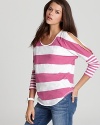 Cutout shoulders lend interest and a peek of skin on this brightly striped C&C California three-quarter sleeve tee.