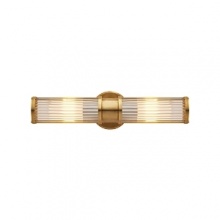The subtle art deco design and warm natural brass of this double Ralph Lauren sconce lends luxurious light to any space. The subtle art deco design and warm natural brass of this double Ralph Lauren sconce lends luxurious light to any space.