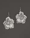 Delicate gardenias, captured at the height of their beauty in sterling silver, bloom on these earrings from Buccellati.