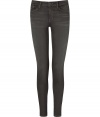 Make a stylish statement in these ultra-skinny jeans from cult denim line J Brand - Classic five-pocket styling, skinny leg, low-rise, 11-inch leg opening - Pair with an oversized graphic tee, a leather jacket, and platform heels