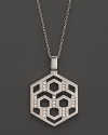 An eye-catching geometric pattern and brilliant diamonds distinguish this sterling silver pendant from India Hicks.