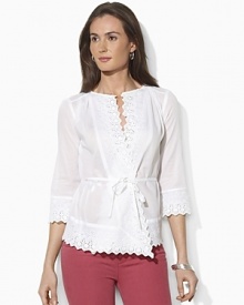 A breezy cotton voile shirt is finished with delicate eyelet trim for a bohemian-inspired look.