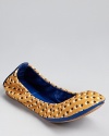 Printed in polka dots, these playful Tory Burch flats boast leather trim in the season's favorite cobalt hue.