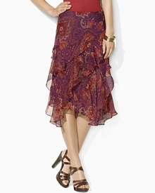 Tiers of ruffles and a sweeping paisley pattern enliven a fluid silk georgette skirt.