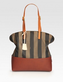 This slightly slouchy and roomy design, tailored from striped fabric and smooth, fine leather, is finished with contrast shoulder straps.Adjustable double leather shoulder straps, 7-9½ drop Top zip closure Two inside open pockets Center zip compartment Linen lining 12W X 13½H X 5D Made in Italy This slightly slouchy and roomy design, tailored from striped fabric and smooth, fine leather, is finished with contrast shoulder straps.Adjustable double leather shoulder straps, 7-9½ drop Top zip closure Two inside open pockets Center zip compartment Linen lining 12W X 13½H X 5D Made in Italy