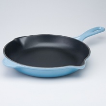 Chefs everywhere attest to the cast iron skillet's ability to produce the perfect balance of crispy golden crust and soft, fluffy interior - perfect for frying, sautéing, omelets and cornbread. The black enamel interior seals in juices for succulent results but is nonreactive, so it won't retain flavors. Chefs everywhere attest to the cast iron skillet's ability to produce the perfect balance of crispy golden crust and soft, fluffy interior - perfect for frying, sautéing, omelets and cornbread. The black enamel interior seals in juices for succulent results but is nonreactive, so it won't retain flavors.