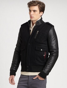 Collegiate-inspired style with an extra dose of attitude, crafted in a rich cotton blend with great attention to detail and sleek leather sleeves for an authentic finishing touch.Zip frontSnap button placketStand collarBanded cuffs and hemZippered chest, waist flap pocketsAbout 27 from shoulder to hem56% cotton/25% polyester/19% polyurethane/Dry cleanImported Collegiate-inspired style with an extra dose of attitude, crafted in a rich cotton blend with great attention to detail and sleek leather sleeves for an authentic finishing touch.Zip frontSnap button placketStand collarBanded cuffs and hemZippered chest, waist flap pocketsAbout 27 from shoulder to hem56% cotton/25% polyester/19% polyurethane/Dry cleanImported