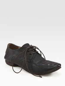 Rustic leather classic with skinny, ultra-long laces. Leather upperLeather lining and solePadded insoleMade in ItalyOUR FIT MODEL RECOMMENDS ordering one half size up as this style runs small. 