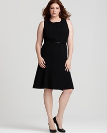 This Calvin Klein essential black dress flaunts a flirtatious flared skirt and belted waist for a ladylike silhouette. This Calvin Klein essential black dress flaunts a flirtatious flared skirt and belted waist for a ladylike silhouette.