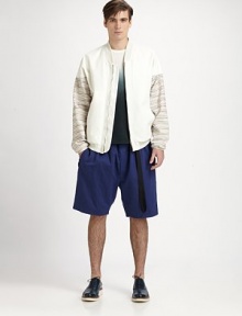 Ultra easy and slightly edgy, these relaxed elastic waist shorts in a cotton/linen blend from Italy have a loop drawstring belt that hangs down one side. Elasticized waistbandZip flyPleated side pocketsOne back welt button-through pocket Inseam, about 10½62% cotton/38% linenDry cleanImported of Italian fabric Ultra easy and slightly edgy, these relaxed elastic waist shorts in a cotton/linen blend from Italy have a loop drawstring belt that hangs down one side. Elasticized waistbandZip flyPleated side pocketsOne back welt button-through pocket Inseam, about 10½62% cotton/38% linenDry cleanImported of Italian fabric