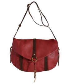 A boho-chic purse for the girl on the go: the Ojai features top-stitched strap detailing, antiqued hardware and a feather-and-bead charm on a sleek leather crossbody silhouette. A boho-chic purse for the girl on the go: the Ojai features top-stitched strap detailing, antiqued hardware and a feather-and-bead charm on a sleek leather crossbody silhouette.