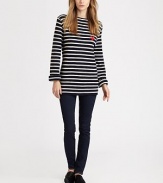 A cozy, oversized silhouette is styled in worsted wool with a wide boatneck and charming embroidered heart detail. About 29 from shoulder to hem Wool; dry clean Imported