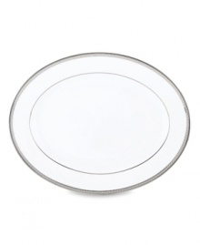 Metropolitan sensibility and modern design combine in this understated white bone china platter from Lenox's collection of dinnerware and dishes. Platinum gild along the edge is enhanced by a clean, platinum geometric pattern reminiscent of architectural accents. Qualifies for Rebate Metropolitan sensibility and modern design combine in this understated white bone china platter from Lenox's collection of dinnerware and dishes. Platinum gild along the edge is enhanced by a clean, platinum geometric pattern reminiscent of architectural accents. Qualifies for Rebate