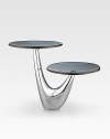As eye-catching as the cakes and tarts it's designed to support, this two-tier server creates its own spotlight on any table. Handcrafted with glass platforms and a curved, lustrous alloy base. 12H X 15 diam. Hand wash Imported
