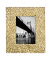 It's metal artistry with a New York edge - display your favorite memories in this hand-cast aluminum frame for a distinctive touch to any home display.HandmadeAluminum alloyImported