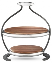 Even ordinary meals get a big reaction with this innovative Anvil server. Featuring a mix of handsome acacia wood and signature Nambe metal with rustic, iron-finished accents. Designed by Neil Cohen. Even ordinary meals get a big reaction with this innovative Anvil server. Featuring a mix of handsome acacia wood and signature Nambe metal with rustic, iron-finished accents. Designed by Neil Cohen.