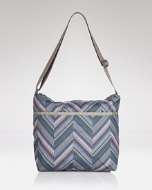 Keep the essentials close with LeSportsac's nylon crossbody bag in chevron print; practical interior zip compartments make those daily errands a little bit easier. Keep the essentials close with LeSportsac's nylon crossbody bag in chevron print; practical interior zip compartments make those daily errands a little bit easier.