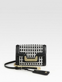 A high-contrast woven wool design accented in smooth leather and radiant hardware.Detachable chain and leather shoulder strap, 23½ dropMagnetic snap flap closureOne outside open pocketOne inside zip pocketFully lined6¾W X 5H X 1½DImported A high-contrast woven wool design accented in smooth leather and radiant hardware.Detachable chain and leather shoulder strap, 23½ dropMagnetic snap flap closureOne outside open pocketOne inside zip pocketFully lined6¾W X 5H X 1½DImported
