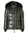 Stay warm while maintaining your luxe style in this sporty, fur trimmed lightweight down jacket from Duvetica - Hooded with raccoon fur trim, long sleeves, black ribbed knit cuffs, two-way hidden metal front zip with looped button placket, snapped front pockets, zippered pocket on sleeve, drawstring hemline - Shorter cut, fitted cuffs - Wear with jeans or corduroys and a cashmere pullover