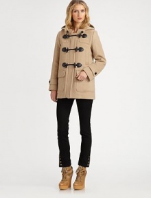 A classic design in pure wool, updated with the Burberry touch.Attached hoodContrast buttons and toggle front closeTwo angle front welt pocketsTwo front patch flap pocketsLong sleeves with button tabsCenter back seam with ventAbout 30 from shoulder to hemWoolDry cleanImportedSIZE & FITModel shown is 5'10½ (179cm) wearing US size 4. This style runs large. We recommend ordering one size down for a standard fit. A classic design in pure wool, updated with the Burberry touch.Attached hoodContrast buttons and toggle front closeTwo angle front welt pocketsTwo front patch flap pocketsLong sleeves with button tabsCenter back seam with ventAbout 30 from shoulder to hemWoolDry cleanImportedSIZE & FITModel shown is 5'10½ (179cm) wearing US size 4. This style runs large. We recommend ordering one size down for a standard fit.