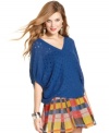 Open-knit design and a chic, slouchy fit add awesome detail to this dolman sleeve sweater from Jessica Simpson.