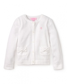 Pink and pretty with bright white buttons and pocket bow details, this Lilly Pulizter cardigan's sure to be her girly go-to sweater. Pink and pretty with bright white buttons and pocket bow details, this Lilly Pulizter cardigan's sure to be her girly go-to sweater.