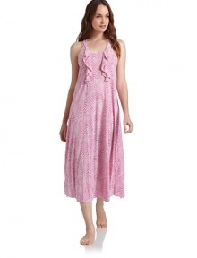 THE LOOKZebra printScoopneckRuffles accent the front bodiceRacerbackCutout back with rufflesTHE FITAbout 48 from shoulder to hemTHE MATERIALPolyester/rayonCARE & ORIGINMachine washImported THE LOOKZebra printScoopneckRuffles accent the front bodiceRacerbackCutout back with rufflesTHE FITAbout 48 from shoulder to hemTHE MATERIALPolyester/rayonCARE & ORIGINMachine washImported