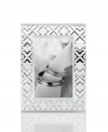 Mirroring the intricate folds of origami, this gleaming silver-plated picture frame makes art of any memory. From Martha Stewart Collection.