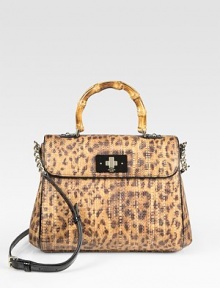 Leopard-printed raffia mixes with bamboo and patent leather accents for an instantly chic flap-top design. Bamboo top handle, 4¼ dropAdjustable detachable patent leather shoulder strap, 18½-21 dropTurnlock flap closureProtective metal feetOne inside zip pocketTwo inside open pocketsFully lined10¼W X 8H X 3DImported Leopard-printed raffia mixes with bamboo and patent leather accents for an instantly chic flap-top design. Bamboo top handle, 4¼ dropAdjustable detachable patent leather shoulder strap, 18½-21 dropTurnlock flap closureProtective metal feetOne inside zip pocketTwo inside open pocketsFully lined10¼W X 8H X 3DImported