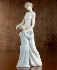 In Spain's renowned Lladró workshops, talented artisans create porcelain sculptures of the highest artistic and technical quality. This Lladró creation is made of fine porcelain, handpainted and glazed to express a special moment. Stands 14-1/2 tall. In Spain's renowned Lladró workshops, talented artisans create porcelain sculptures of the highest artistic and technical quality. This Lladró creation is made of fine porcelain, handpainted and glazed to express a special moment. Stands 14-1/2 tall.