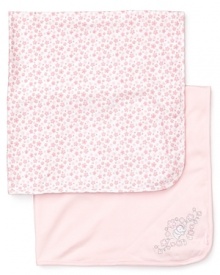 One solid and embroidered and one floral print, these luxe receiving blankets bring your little girl into the world in comfort and style.
