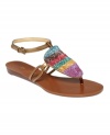 Delightfully cute. The Wonderous flat thong sandals by Nine West are colorful and beaded with a shiny ankle strap.