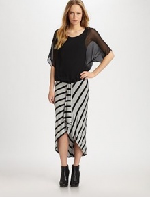 Stretch jersey with a playfully ruffled hem and asymmetrical stripes that make you look slimmer. Elastic waistbandAsymmetrical ruffle hemAbout 39 long96% rayon/4% spandexHand washMade in USAModel shown is 5'10 (177cm) wearing US size 4. Stretch jersey with a playfully ruffled hem and asymmetrical stripes that make you look slimmer. Elastic waistbandAsymmetrical ruffle hemAbout 39 long96% rayon/4% spandexHand washMade in USAModel shown is 5'10 (177cm) wearing US size 4.