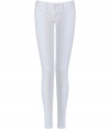 Elevate your casual look with these bright white skinnies from True Religion - Low-rise, classic five-pocket styling, slim fit, skinny leg - Style with an oversized blouse, a boyfriend blazer, and embellished ballet flats