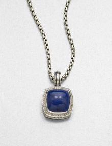 From the Albion Collection. A lapis cabochon set in sterling silver accented with brilliant diamonds on a bale. LapisDiamonds, .48 tcwSterling silverSize, about .66ImportedPlease note: Chain sold separately. From the Albion Collection. A lapis cabochon set in sterling silver accented with brilliant diamonds on a bale. LapisDiamonds, .48 tcwSterling silverSize, about .66ImportedPlease note: Chain sold separately.