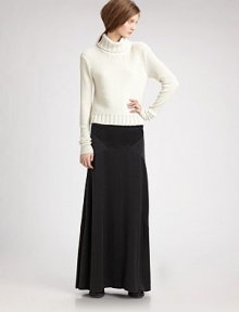 Long flared style with contrast insets below the hips.Elasticized grosgrain waist Back zipper with hook-and-eye Silk lining About 45 long Silk Dry clean Imported Long flared style with contrast insets below the hips.Elasticized grosgrain waist Back zipper with hook-and-eye Silk lining About 45 long Silk Dry clean Imported