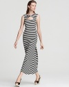 A striped Oonagh by Nanette Lepore maxi dress masters nautical chic, featuring a geometric cutout at the yoke and a twist at the neckline for a modern revision of the seafaring style.