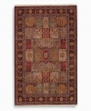 The large size of this rug makes it ideal for great rooms and other open spaces. A striking example of classic Bakhtiyari designs, this rug features organic motifs in a panel design of reds, greens and golds, finished with a rosette border. A special antique wash enhances and harmonizes the burnished colors to create a rich vintage finish. Woven in the USA of luxuriously soft premium worsted New Zealand wool.