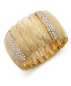 Slip on crystal sparkle with this cuff bracelet from Alfani. The rectangular link design is prettied up with glass stone accents. Stretches to fit wrist. Crafted in gold tone mixed metal. Approximate diameter: 2-1/4 inches.