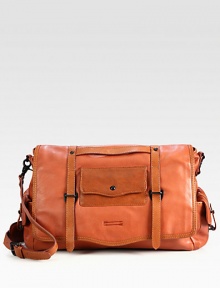 Rich, refined leather in a thoughtfully designed bag with places for all your work-day essentials.Flap closureAdjustable shoulder strapExterior, interior pocketsFully linedLeather16W x 11H x 5DImported Rich, refined leather in a thoughtfully designed bag with places for all your work-day essentials.Flap closureAdjustable shoulder strapExterior, interior pocketsFully linedLeather16W x 11H x 5DImported