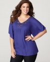 A beaded neckline beautifully embellishes Style&co.'s short sleeve plus size top-- team it with your favorite casual bottoms. (Clearance)