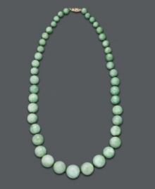 Spruce up your style in fresh, spring color. This beautiful, graduated necklace features jade beads (7-17 mm) set in 14k gold. Approximate length: 18 inches. Spruce up your style in fresh, spring color. This beautiful, graduated necklace features jade beads (7-17 mm) set in 14k gold. Approximate length: 18 inches.