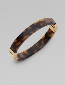 Glossy tortoise print resin design with goldtone accents and hinge closure. ResinGoldtoneDiameter, about 2¾Hinged closureImported Glossy tortoise print resin design with goldtone accents and hinge closure. ResinGoldtoneDiameter, about 2¾Hinged closureImported